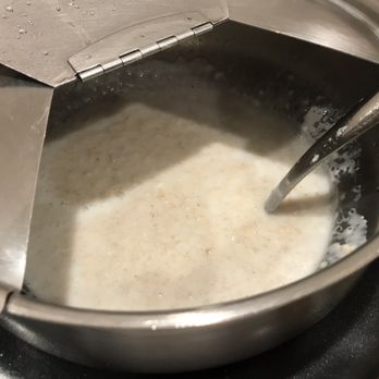 Sycamore Tap & Table - a pan of milk being stirred - Beer Bar Near Me - Chico, California Sycamore Tap & Table - a pan of milk being stirred - Beer Bar Near Me - Chico, California
