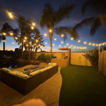 Holy Greens & Turf - Backyard lighting hung - Artificial Turf Near Me Holy Greens & Turf - Backyard lighting hung - Artificial Turf Near Me
