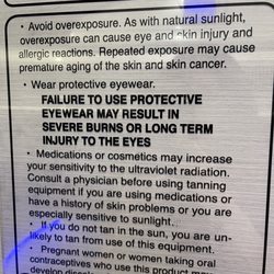 Electric Sun Tanning Salons - This is legit hanging on the walls next to their beds!!