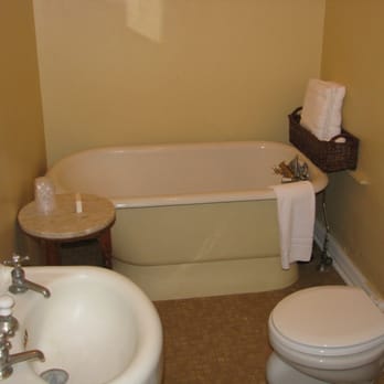 Hotel Wolf - Bathroom was a bit small as was the tub. At 6'1" tall, I had a bit of an issue fitting into the tub and there was no shower curtain. - Hotels Near Me - Saratoga, Wyoming Hotel Wolf - Bathroom was a bit small as was the tub. At 6'1" tall, I had a bit of an issue fitting into the tub and there was no shower curtain. - Hotels Near Me - Saratoga, Wyoming