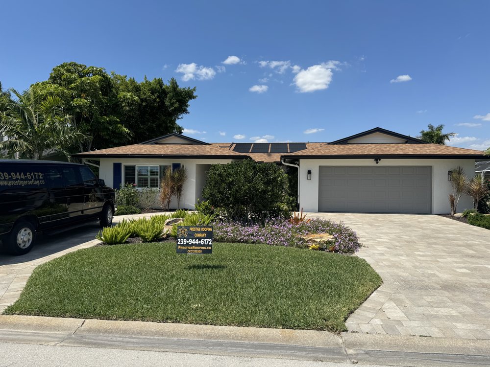 Slide of Prestige Roofing Company