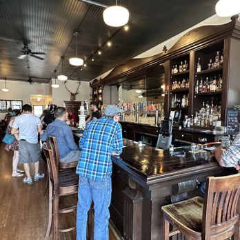 Krug Park - people sitting at the bar - Pubs Near Me - Omaha, Nebraska