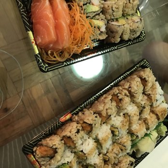 Sushi 21 - two trays of sushi on a table - Sushi Bars Near Me - New York, New York Sushi 21 - two trays of sushi on a table - Sushi Bars Near Me - New York, New York