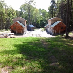 Rustic cabins, with no linens, no lights in shower room or kitchen, and no laundry. No resupply store.