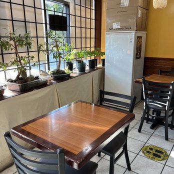 Hapag Ihaw-Ihaw - a table and chairs in a restaurant - Filipino Near Me - Vancouver, British Columbia Hapag Ihaw-Ihaw - a table and chairs in a restaurant - Filipino Near Me - Vancouver, British Columbia