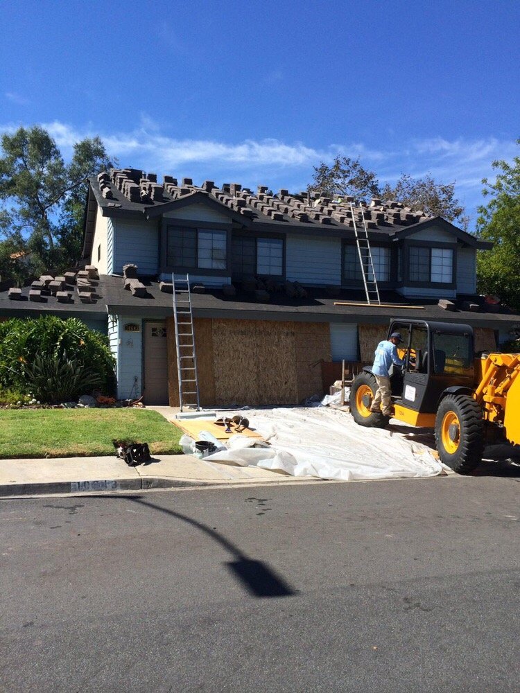 Slide of Grand Pros Roofing