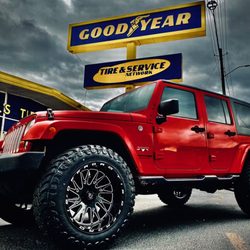 HILLS TIRE & AUTO SERVICE - Rough country lift with new wheels and tires.