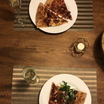 Pinthouse Pizza - a slice of pizza on a plate - Pizza Near Me - Austin, Texas Pinthouse Pizza - a slice of pizza on a plate - Pizza Near Me - Austin, Texas
