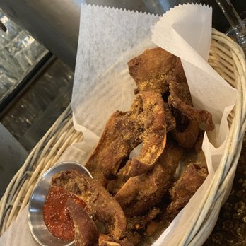 Thip Khao - Fried pig ears with a yummy chill sauce - Laotian Near Me - Washington, DC, District of Columbia Thip Khao - Fried pig ears with a yummy chill sauce - Laotian Near Me - Washington, DC, District of Columbia