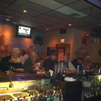 Cementos - a group of people sitting at a bar - Pubs Near Me - Columbus, Ohio Cementos - a group of people sitting at a bar - Pubs Near Me - Columbus, Ohio