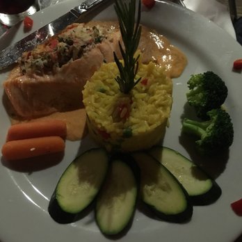 Costa Brava - Stuffed salmon, rice and vegetables. - Tapas Bars Near Me - San Diego, California Costa Brava - Stuffed salmon, rice and vegetables. - Tapas Bars Near Me - San Diego, California