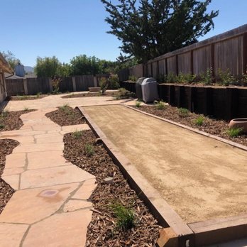 TCT Landscaping - We wanted usable space instead of grass. The Cornhole court/ mini bocce ball court is a great addition. - Landscape Architects or Designers Near Me - Buellton, California TCT Landscaping - We wanted usable space instead of grass. The Cornhole court/ mini bocce ball court is a great addition. - Landscape Architects or Designers Near Me - Buellton, California