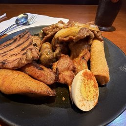 Mushrooms wings egg roll deviled egg chicken on a skewer. Mushrooms wings egg roll deviled egg chicken on a skewer.