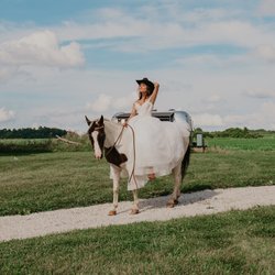 Cedar Bay Farm - Bride riding a horse