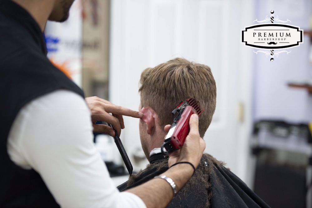 Premium Barber shop fades and scissors Logo