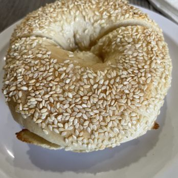 East Coast Bagel - Sesame bagel with cream cheese - Bagels Near Me - Riverside, California East Coast Bagel - Sesame bagel with cream cheese - Bagels Near Me - Riverside, California