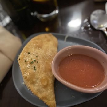 Osteria Povera - a plate of food and a bowl of soup - Italian Near Me - Port Moody, British Columbia