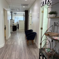 Spacious office with both open bay for siblings and private rooms.