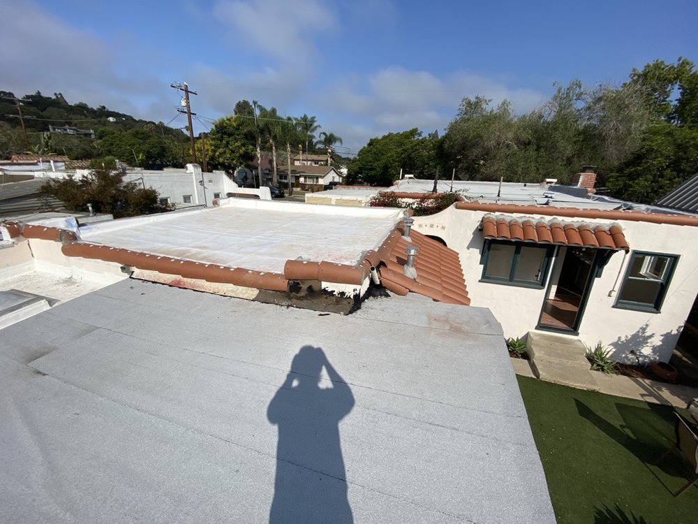 Slide of Titan Roofing & Rain Gutters Inc.