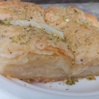 Alnawaeer Sweets - Inside the cream-filled Baklawa. It's sold by the pound. These 4 pieces were $6.88. - Bakeries Near Me - Ottawa, Ontario Alnawaeer Sweets - Inside the cream-filled Baklawa. It's sold by the pound. These 4 pieces were $6.88. - Bakeries Near Me - Ottawa, Ontario