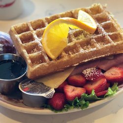 Belgian Waffle Works - Brussels Belgian! Monte Cristo style waffle Stuffed with ham, turkey and swiss cheese. Served with strawberry preserves & cream cheese.