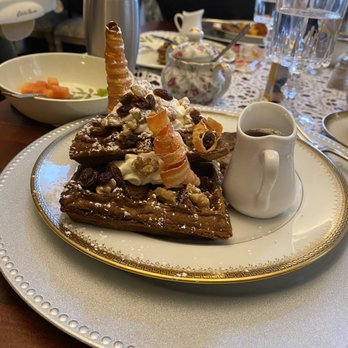 Buffalo Harmony House - Another view of the carrot waffles with raisins, whipped cream, and candied carrots (and maple syrup and sausage patty). - Bed & Breakfast Near Me - Buffalo, New York Buffalo Harmony House - Another view of the carrot waffles with raisins, whipped cream, and candied carrots (and maple syrup and sausage patty). - Bed & Breakfast Near Me - Buffalo, New York