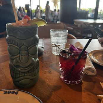 Deck. - I think it was called "who do you think you are?" Mocktail and the small glass was something Waikīkī Mai tai - Hawaiian Near Me - Honolulu, Hawaii