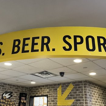 Buffalo Wild Wings - Above the cashier counter - American Near Me - Dulles, Virginia Buffalo Wild Wings - Above the cashier counter - American Near Me - Dulles, Virginia