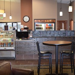 Peak Juice Bar counter and dining area at Peak Health and Wellness Center Coeur d'Alene, a full-service Idaho gym.