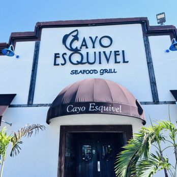 Cayo Esquivel - Restaurant Exterior Charming entrance with tropical touches sets the tone for a great meal inside. - Seafood Near Me - Miami, Florida
