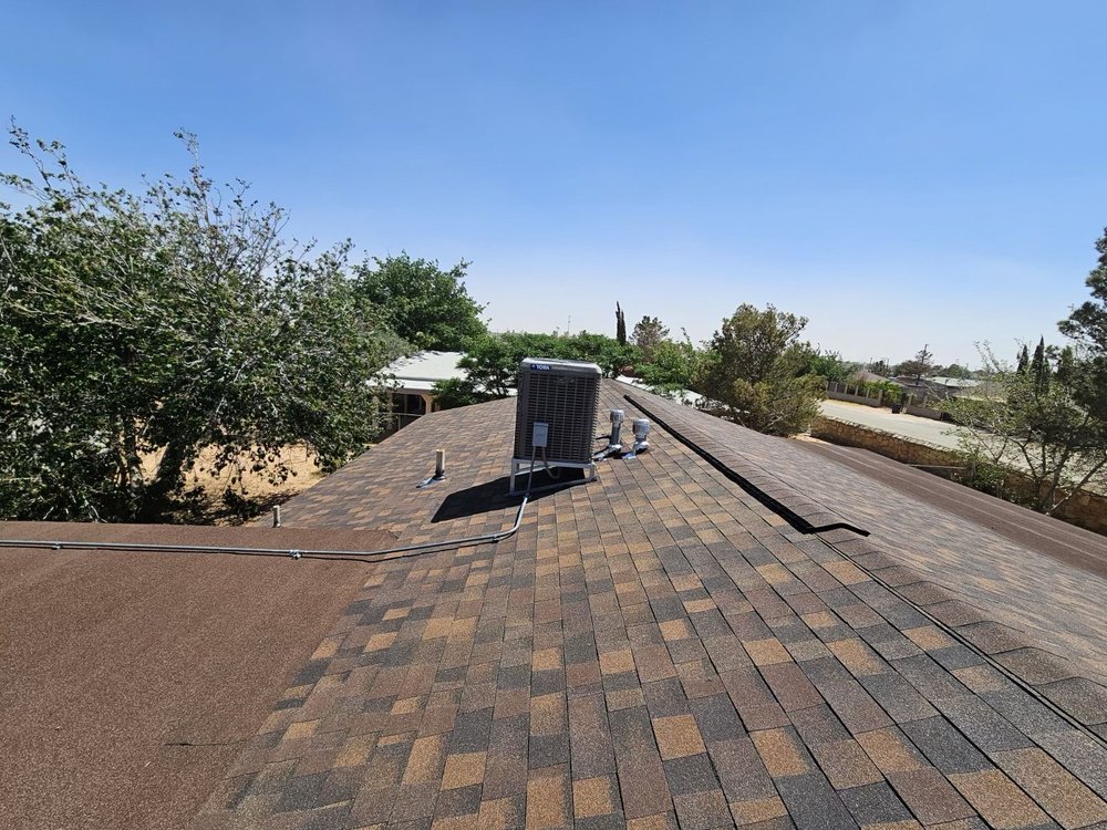 Slide of Sagan Commercial Roofing