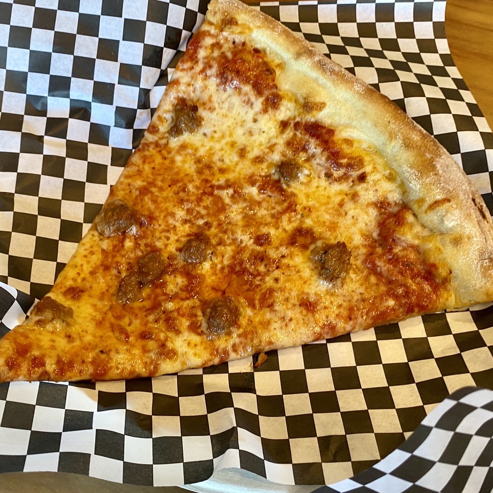 The Thirsty Sasquatch - Slice of Sausage Pizza - Pubs Near Me - Vancouver, Washington The Thirsty Sasquatch - Slice of Sausage Pizza - Pubs Near Me - Vancouver, Washington