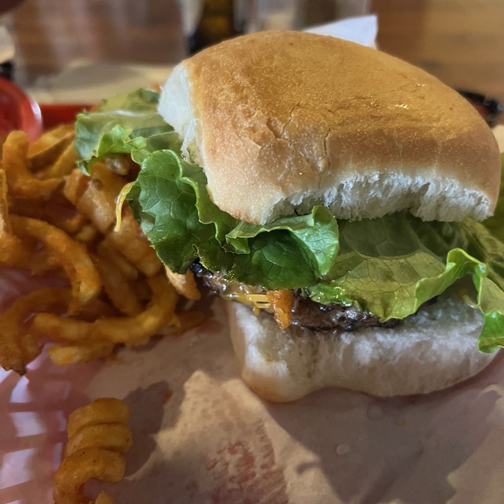 Hondo's - Hondo burger with curly fries - Bars Near Me - Fredericksburg, Texas