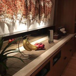 Four Seasons Airport Lounge - Snack area. Fruit, granola bars, chips and popcorn. Coffee machine and ice and soda machine