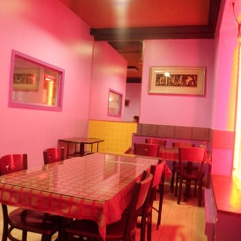 Hot Wok - a dining area with a table and chairs - Hakka Near Me - Toronto, Ontario