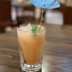 Thai 9 - The Typhoon Cocktail I love the windblown umbrella-cute touch!