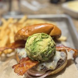BJ's Restaurant & Brewhouse - Bacon-Guacamole Deluxe Burger.