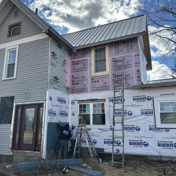 Affordable Roofing, Siding & Gutters - Siding going up - Roofing Near Me