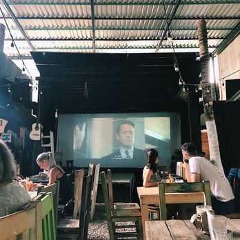 Batey - Movie playing in the back - Cocktail Bars Near Me - Tulum, ROO