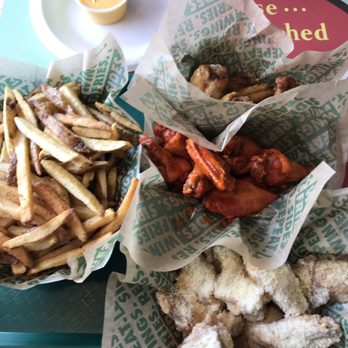 Wingstop - Lemon Pepper, Original Hot, & Garlic Parmesan wings. Great fries and cheese dipping sauce - Chicken Wings Near Me - Indianapolis, Indiana Wingstop - Lemon Pepper, Original Hot, & Garlic Parmesan wings. Great fries and cheese dipping sauce - Chicken Wings Near Me - Indianapolis, Indiana
