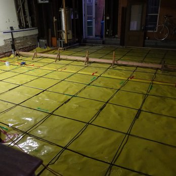 Sunset Concrete - a concrete floor being laid in a basement - General Contractors Near Me - San Francisco, California Sunset Concrete - a concrete floor being laid in a basement - General Contractors Near Me - San Francisco, California