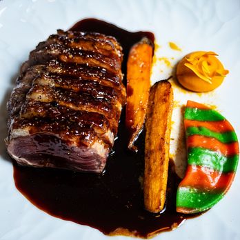 Lucie - Le Canard ($56.00). Duck "A l'Orange", Carrot Ravioli, Orange & Honey Reduction - French Near Me - Toronto, Ontario Lucie - Le Canard ($56.00). Duck "A l'Orange", Carrot Ravioli, Orange & Honey Reduction - French Near Me - Toronto, Ontario