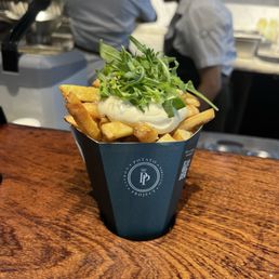 My cousin's truffle fries, eye rolling employee directly behind