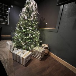White Paper BBQ - Eat 20 lbs of Brisket and get off Santa's naughty list  (get a free present from the tree)