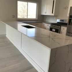 Impeccable Marble & Granite - Our Customer wanted a custom design with a waterfall edge.