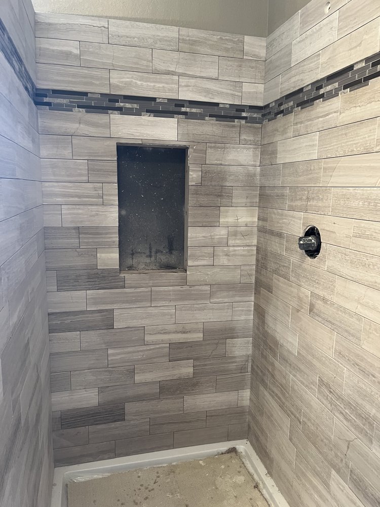 Slide of MKV Custom Remodels