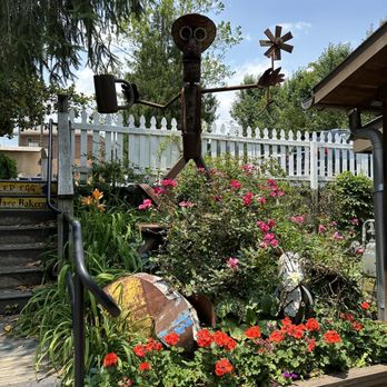 Hubba Hubba Smokehouse - a garden with flowers - Barbeque Near Me - Flat Rock, North Carolina Hubba Hubba Smokehouse - a garden with flowers - Barbeque Near Me - Flat Rock, North Carolina