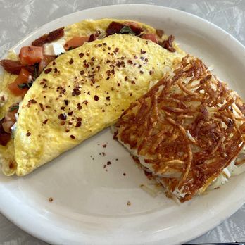The Nucleus Cafe - Peppered Bacon Omelette with hash browns - Breakfast & Brunch Near Me - Eau Claire, Wisconsin