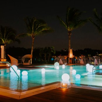 Gerych's Flowers & Events - Little accents like these lights in the pool were a great touch. - Florists Near Me - Fenton, Michigan Gerych's Flowers & Events - Little accents like these lights in the pool were a great touch. - Florists Near Me - Fenton, Michigan