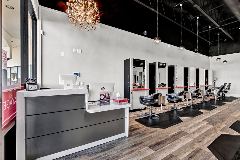 Barber at Prestige Salon & Spa Logo